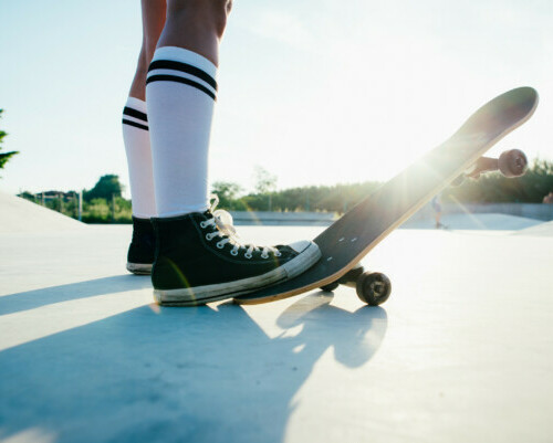 Beautiful skater girl lifestyle moments in a skatepark